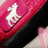 Pixelated icon shows white stylized figure on pink background with black diagonal stripe.