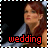 A 48x48 pixel animated contact sheet showing two frames of a woman with long brown hair in a gray top, with red text reading "wedding" and "from hell" respectively below her face against a black background.