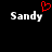 Two side-by-side displays of the name 'Sandy' in white pixelated text on black background, with a red heart symbol above left display.