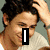 A four- shows a person with dark hair in various poses, with text overlays reading 'I', 'Luv', and 'Nick Jonas'