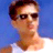 Static pixelated image of a person with brown hair and sunglasses against blue background, wearing white shirt, low-resolution 48x48 icon rendered at 256x256 pixels.