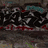 Animated sequence showing graffiti-style text transitioning to a blue character with large eyes and a wide mouth.