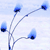 Pixelated blue and white icon showing four flower-like shapes with dark blue centers on thin stems against a light blue background.