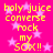 Bright pink background with light pink stars and yellow pixelated text reading "holy juice converse rock my sox!!" in four identical