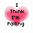 Pixelated pink heart with black text reading "I Think I'm Falling" above and "No Wait I Am In Love" below, transitioning to "In Love With You" on the right.