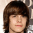 A pixelated image of a person with brown hair and a neutral expression, next to red text reading '<3 Mrs. Johnny Simmons' on a black background.