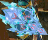 Four distinct animated icons display elemental effects: blue lightning, pink smoke, green leaves, and orange fire with black embers.