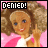Pixelated image of a smiling figure with curly brown hair wearing a pink and white top, making a middle finger gesture under a 'DENIED!' text box.