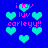 Blue background with cyan hearts and pink text reading "i luv luv carleyy!!" in pixelated style.