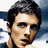 Pixelated image of a person with dark hair on the left, and pink text reading 'From zero to HERO' over green and blue circular shapes on the right.