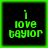 Four identical pixelated green text icons on black backgrounds with bright green borders, each displaying "i love taylor" in a retro digital font.
