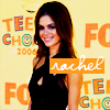 A woman with long brown hair smiles in a black dress against a yellow background with orange and multicolored text.