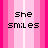 A vertical strip of pink and white striped background with pixelated text reading "She smiles", "acts like everything is alright but no one knows she's hurting inside..." in alternating black and white colors.
