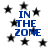 Blue text "IN THE ZONE" repeated four times on white background with scattered black stars.