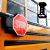 Animated sequence showing a school bus with stop sign, text changing from 'I' to 'TAKE THE', then 'BUS got a problem with that?', and the bus moving forward.