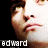 A pixelated close-up of a person's face with brown hair, showing two side-by-side views where the right view has slightly brighter lighting on the cheek and forehead.