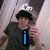 A person in a dark shirt and black hat appears across four with changing text overlays