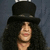 Pixelated image of a person with long dark hair wearing a black top hat and dark clothing against a dark blue background.