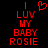 Red pixelated text on black background reads 'I LUV MY BABY ROSIE' with a heart symbol replacing the 'O' in 'LOVE', displayed as two side-by-side static frames.