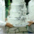 A 48x48 pixel animated buddy icon featuring a person in white clothing holding an object, paired with green text reading "Original Icons .com" on the right side of a contact sheet layout.