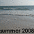 A beach scene with waves and sand, featuring the text 'summer 2008' at the bottom.