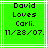 Green background with white lines and black pixelated text reading 'David Loves Carli. 11/28/07.' in two identical