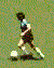 Animated sequence of a soccer player in light blue jersey and dark shorts kicking a white ball on green field, showing multiple motion frames.
