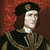 Pixelated portrait of a person with dark hair and a dark cap, wearing a dark garment with a light collar against a reddish-brown background.