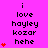 A static image with a bright pink background displays repeated text 'i love hayley kozar hehe' in black pixelated font, accompanied by red heart symbols on the left and right sides.