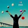Silhouette of person with arms raised against blue sky, holding floating balloons, with 'BE FREE' text above.