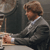 Static pixelated image of a man in business attire holding an object, likely from a historical AIM buddy icon set.