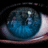 A 3x3 contact sheet of animated frames showing a blue eye reflection, transitioning to a dark forest scene with two figures walking through misty woods, followed by text elements "RESIDENT EVIL" and "OUTBREAK" on solid color backgrounds.