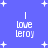 Blue background with white pixelated text 'I love Leroy' and scattered star shapes, featuring animation changes in the lower-right corner.