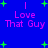 Blue background with green plus signs and pink text reading "I Love That Guy" in two mirrored sections.