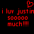 Red pixelated text and heart symbol on black background with repeated phrases 'i luv justin' and 'sooooo much!!!!'