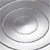 nine circular metallic objects with concentric rings, each showing subtle variations in shading and reflection across the frames