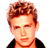 Static pixelated image of a person with light brown hair and fair skin wearing a dark jacket over an orange shirt against a white background.