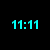 Cyan pixelated text on black background shows time and wish message changing from '11:11 I wish for..' to '11:12 GARNET!' with no other visual elements.