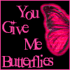 Pink text "You Give Me Butterflies" on black background with pink butterfly graphic, animated with text and butterfly changes.