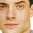 Static 48x48 pixel icon showing a close-up of a person's face with visible eyes, nose, mouth, and partial hairline against a light background.