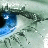 A pixelated close-up of a blue eye with white highlights against a muted green and gray background.