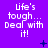 Purple background with white pixelated text reading 'Life's tough... Deal with it!' and small dark blue symbols scattered across the