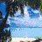 Animated beach scene with shifting sky colors from blue to purple, changing cloud patterns over water and sand.