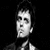 Black-and-white pixelated contact sheet showing a partial portrait of a person on the left and bold text reading "GREEN DAY" on the right, with visible dithering and low-resolution rendering artifacts.