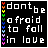 24 pixelated text-based icons displaying "don't be afraid to fall in love" with rainbow-colored letters on black backgrounds, each icon showing a different color sequence