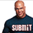 Pixelated image of a bald man with short facial hair wearing a dark blue shirt featuring large light-colored text.