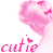 Pink-toned doll head with short hair, small butterfly motifs, and 'cutie' text with heart symbol on white background.