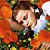 A 50x50 pixel animated buddy icon featuring a cartoon character with brown hair and white wings lying among orange flowers, next to green text reading "Original Icons .com" on a dark background.
