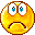 Pixelated yellow emoji with downturned mouth, blue eyes showing distress; one frame shows closed eyes while others show open eyes.