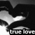 Black-and-white pixelated image of a stylized orca whale with white underbelly and eye patch, positioned above text reading 'true love' in lowercase letters.